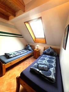 Schlafzimmer 2 mit zwei Einzelbetten Ferienwohnung 4